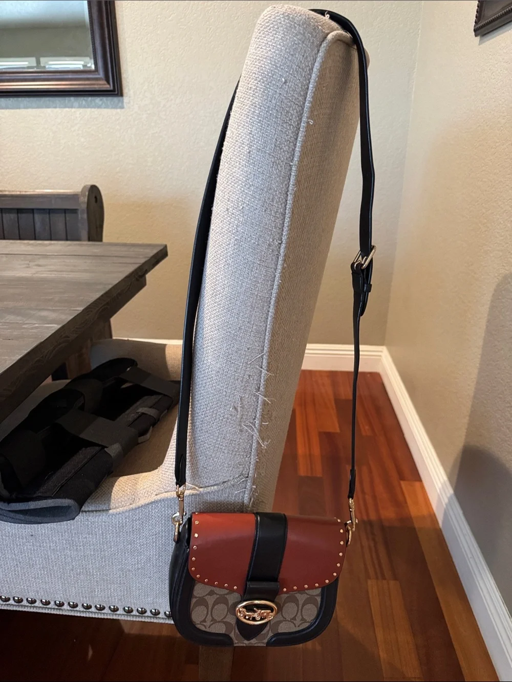 Coach Two-Tone Signature Saddle Crossbody — Rust Red, Black, and Tan